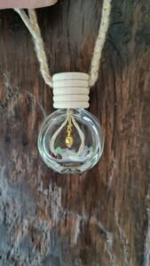 Fiole "prestige" avec aventurine, tourmaline et quartz rose, avec tressage et breloque coeur